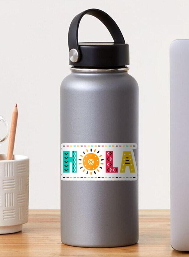 Hola, hi in Spanish Colorful sticker on a bottle put on a table
